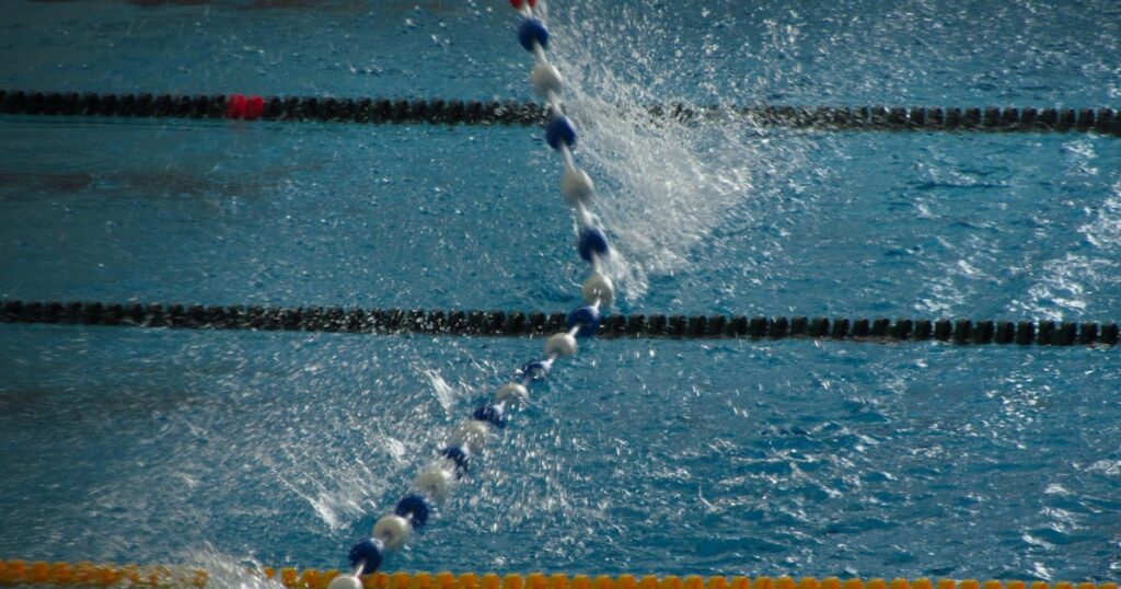 Swimming pool with blue water representing pool accident claims in the UK