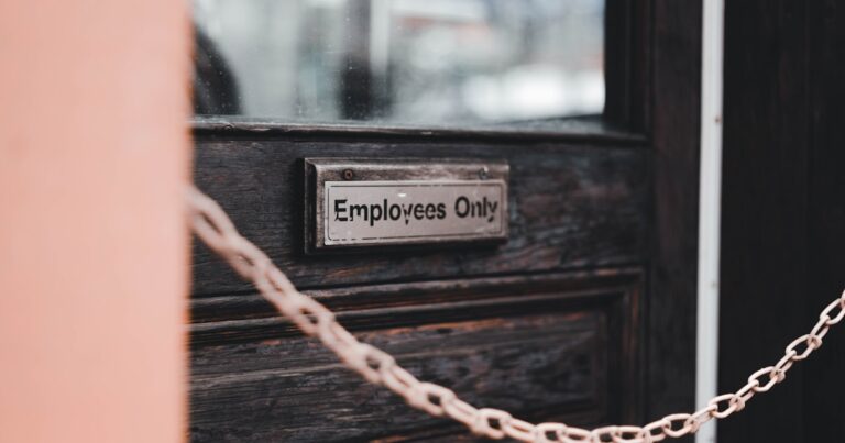 Chain on door representing age discrimination barriers in UK workplaces