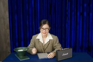 Professional at desk with laptop considering job applications