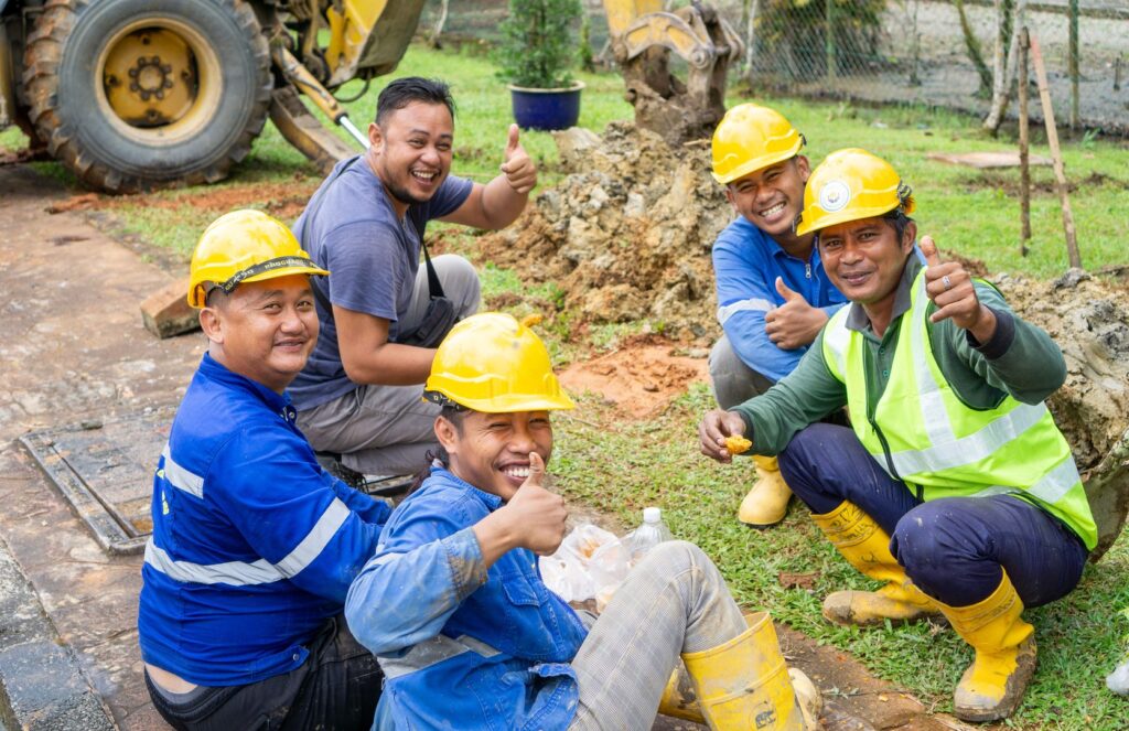 Construction workers taking a lunch break at a work site