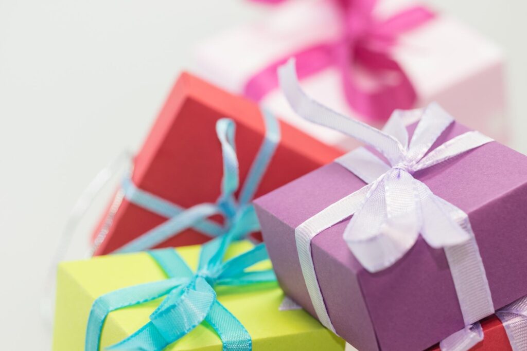 Wrapped gift boxes with colourful ribbons