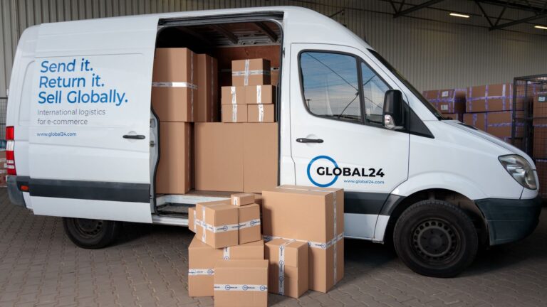 Cardboard parcels stacked inside a delivery van